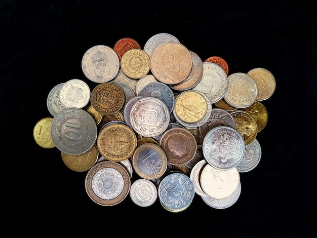 What to do with left over foreign coins? - Wild About Travel