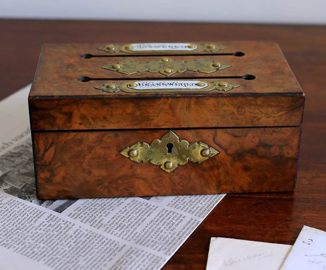 Lot - A 19th century cast iron money box