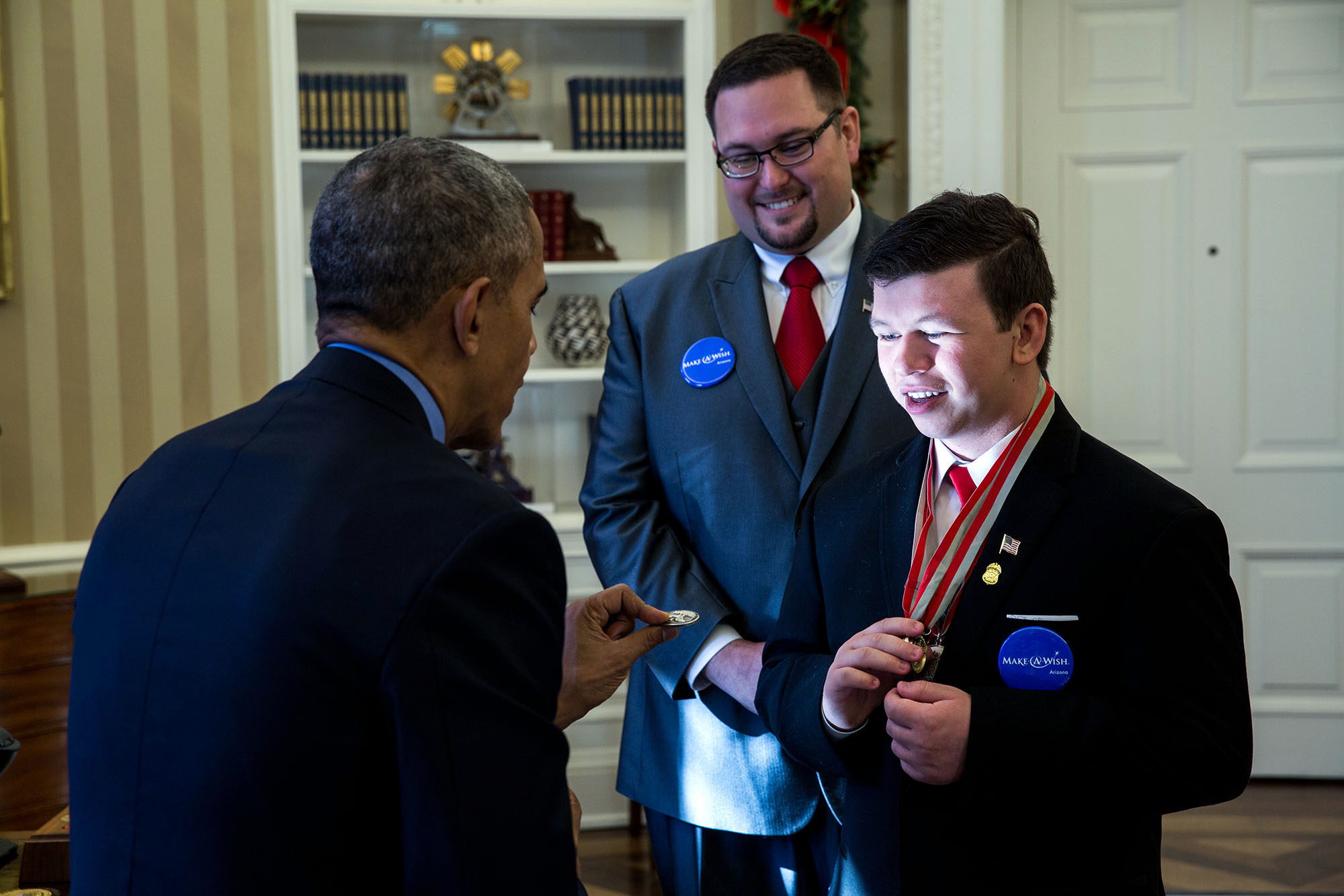 President Obama Gives a Challenge Coin to Kids Science Advisors | The White House