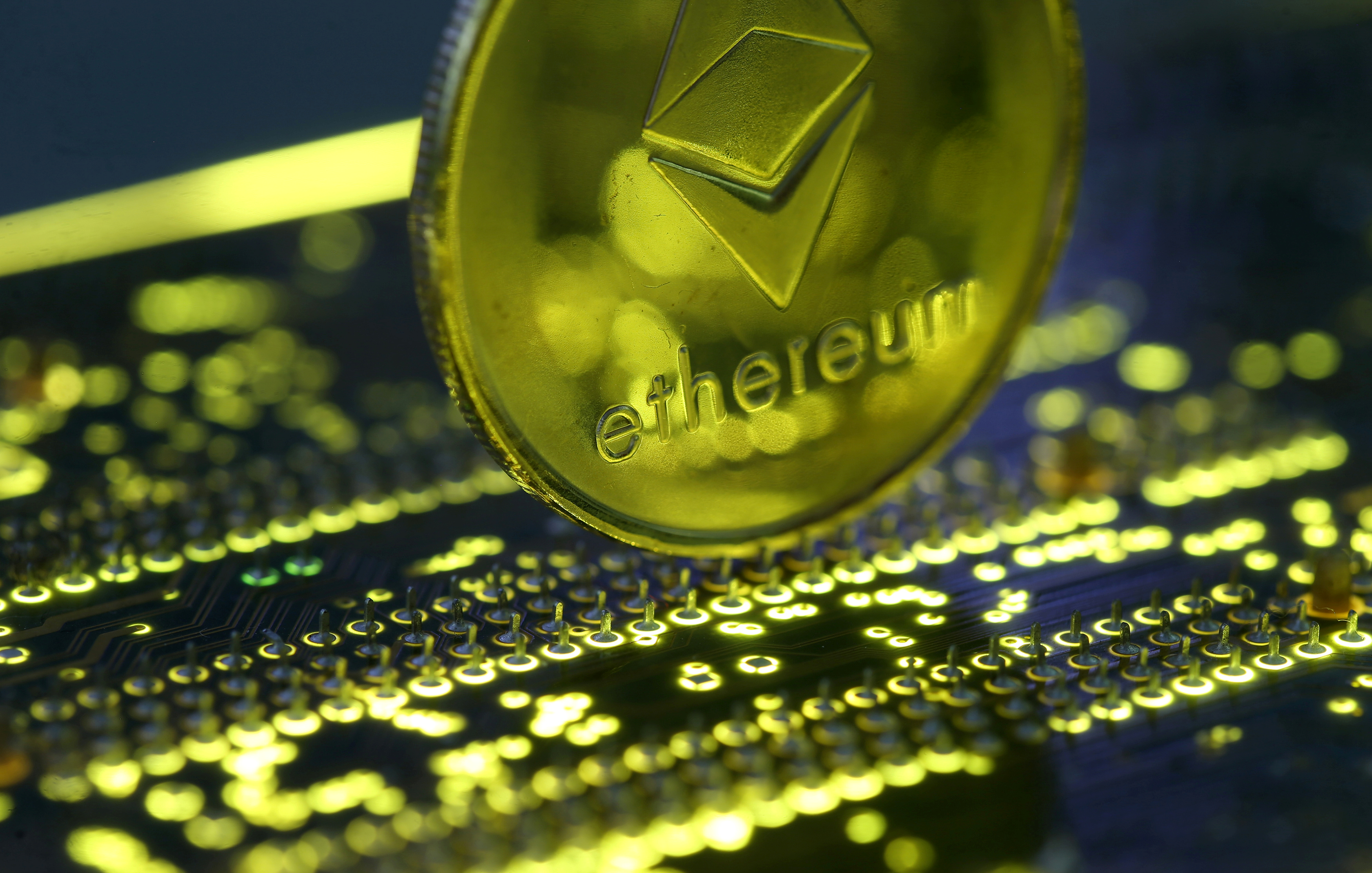 Ether seeks to escape bitcoin's shadow with CME futures launch | Reuters