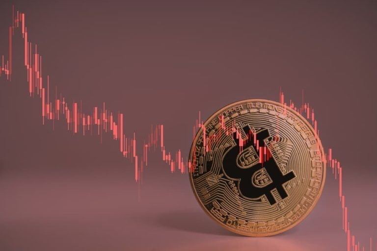 Volatile bitcoin falls from record high as crypto frenzy hits pause | Reuters